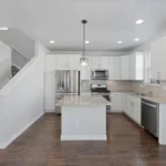 Photo of a house kitchen.