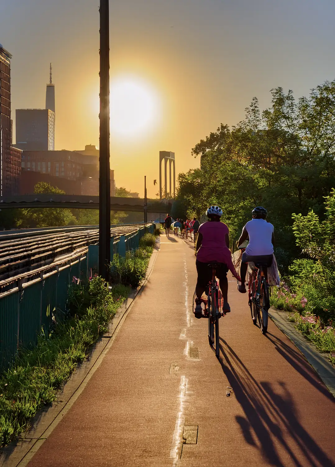 An image of people biking on a trail for Centennial, Colorado.