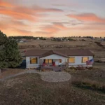 front of house at 34188 goldenrod cir.